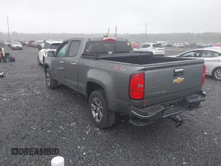 2018 Chevrolet Colorado 4WD Z71 with VIN 1GCGTDEN3J1327344, listed as a IAAI auction lot 42471944 with 153,499 mi miles and . Bid and sale history available at DreamBid. Image 3.