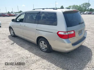2007 Honda Odyssey EX-L z VIN 5FNRL38797B042602, wystawiony jako IAAI lot #42300656 z przebiegiem 250 000 mil mil oraz . Historia ofert i sprzedaży dostępna na DreamBid. Obrazek 3.