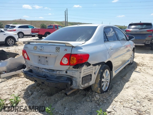 2010 Toyota Corolla with VIN 2T1BU4EE3AC516238, listed as a IAAI auction lot 42013212 with 103,257 mi miles. Bid and sale history available at carsss.com. Image 4.