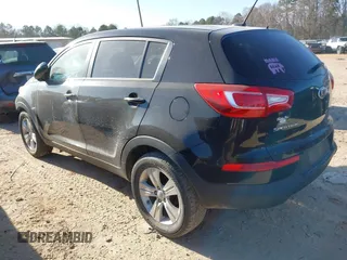 2013 Kia Sportage LX with VIN KNDPB3A21D7447783, listed as a IAAI auction lot 41656090 with 193,795 mi miles. Bid and sale history available at carsss.com. Image 3.