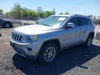 2014 Jeep Grand Cherokee Limited with VIN 1C4RJFBG4EC546307, listed as a IAAI auction lot 42168995 with 199,538 mi miles. Bid and sale history available at carsss.com. Image 2.