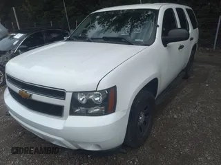 2013 Chevrolet Tahoe Commercial with VIN 1GNLC2E05DR351035, listed as a IAAI auction lot 42641974 with 265,608 mi miles and . Bid and sale history available at DreamBid. Image 17.