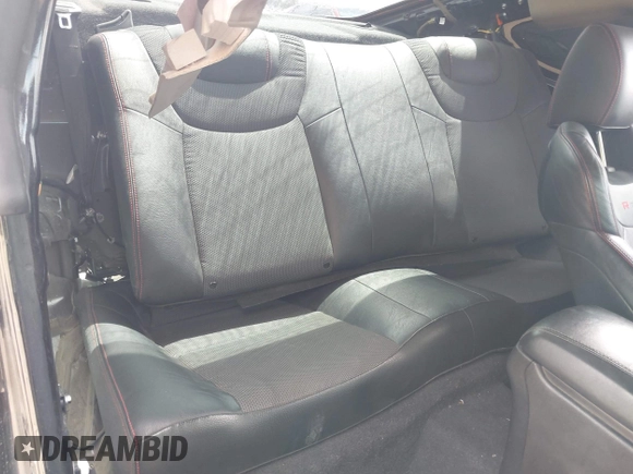 2014 Hyundai Genesis Coupe Ultimate with VIN KMHHU6KJ1EU120076, listed as a IAAI auction lot 42373762 with 100,537 mi miles and . Bid and sale history available at DreamBid. Image 8.