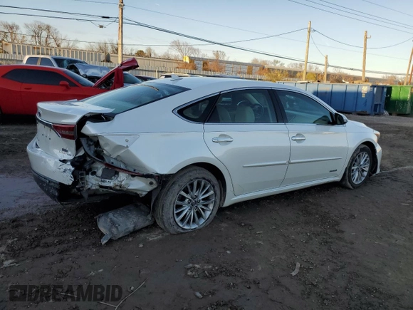 2018 Toyota Avalon Hybrid XLE Plus z VIN 4T1BD1EBXJU059818, wystawiony jako Copart lot #88440805 z przebiegiem 129 346 mil mil oraz Szkoda całkowita • Salvage title. Historia ofert i sprzedaży dostępna na DreamBid. Obrazek 3.