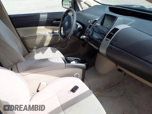 2005 Toyota Prius with VIN JTDKB20U853031729, listed as a IAAI auction lot 42122028 with 299,999 mi miles. Bid and sale history available at carsss.com. Image 5.