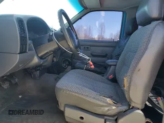 1997 Nissan Frontier XE with VIN 1N6SD16S0VC301978, listed as a Copart auction lot 51868585 with 183,836 mi miles and Clean title. Bid and sale history available at DreamBid. Image 7.