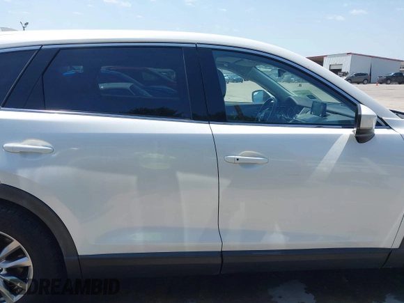 2019 Mazda CX-9 Touring z VIN JM3TCBCY2K0300702, wystawiony jako IAAI lot #42194050 z przebiegiem 98 247 mil mil oraz . Historia ofert i sprzedaży dostępna na DreamBid. Obrazek 13.