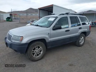 2004 Jeep Grand Cherokee Laredo with VIN 1J4GW48N14C434351, listed as a IAAI auction lot 41860077 with 152,404 mi miles and . Bid and sale history available at DreamBid. Image 2.