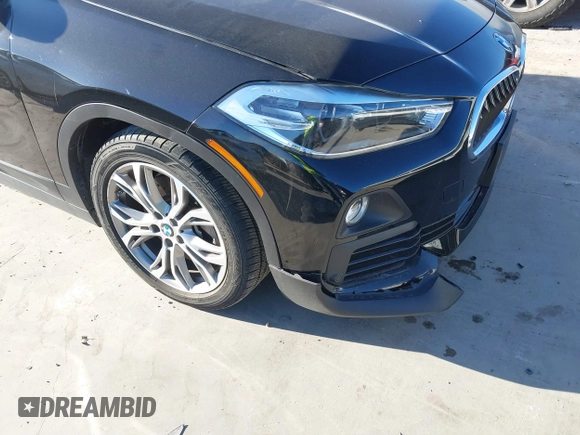 2019 BMW X2 sDrive28i with VIN WBXYJ3C50KEP77327, listed as a IAAI auction lot 40922194 with 94,672 mi miles. Bid and sale history available at carsss.com. Image 21.