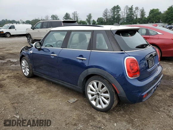 2016 MINI Hardtop 4 Door S with VIN WMWXU3C56G2D29439, listed as a Copart auction lot 64166115 with 56,173 mi miles and Salvage title. Bid and sale history available at DreamBid. Image 2.