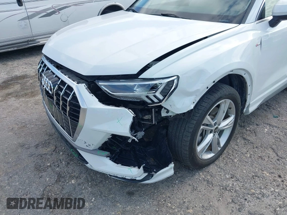 2022 Audi Q3 S line Premium Plus with VIN WA1EECF32N1065423, listed as a IAAI auction lot 42081354 with 27,071 mi miles and . Bid and sale history available at DreamBid. Image 6.