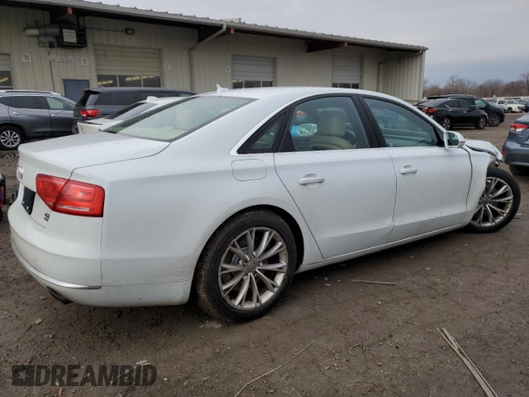 2012 Audi A8 с VIN WAUAVAFD0CN036751, выставлен на аукционе Copart как лот 86383784 с пробегом 96 658 миль миль и Списание • Salvage title. История ставок и продаж доступна на DreamBid. Изображение 3.