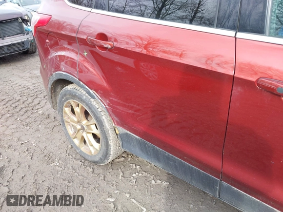 2015 Ford Escape Titanium with VIN 1FMCU9JX1FUA56091, listed as a IAAI auction lot 41947035 with 191,297 mi miles and . Bid and sale history available at DreamBid. Image 17.