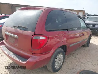 2007 Chrysler Town & Country SWB with VIN 1A4GJ45R57B120394, listed as a IAAI auction lot 41684731 with 219,802 mi miles. Bid and sale history available at carsss.com. Image 4.