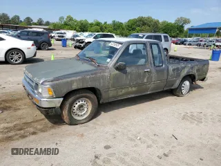 1992 Toyota Pickup DLX z VIN JT4RN93P5N5049078, wystawiony jako Copart lot #53206505 z przebiegiem 241 359 mil mil oraz Czysty tytuł • Clean title. Historia ofert i sprzedaży dostępna na DreamBid. Obrazek 1.
