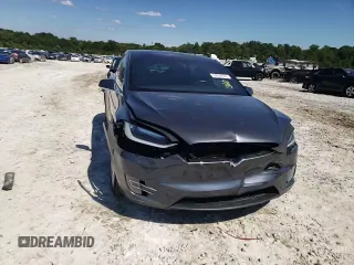 2017 Tesla Model X 90D z VIN 5YJXCDE23HF051027, wystawiony jako Copart lot #64608843 z przebiegiem 77 222 mil mil oraz Szkody całkowita. Historia ofert i sprzedaży dostępna na DreamBid. Obrazek 12.