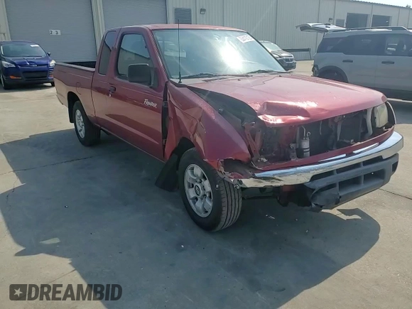 2000 Nissan Frontier XE with VIN 1N6DD26SXYC393054, listed as a Copart auction lot 62410125 with 106,319 mi miles and Salvage title. Bid and sale history available at DreamBid. Image 14.