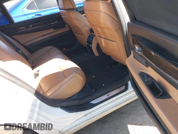 2012 BMW 7 Series 750Li with VIN WBAKB8C52CDX20757, listed as a IAAI auction lot 42057654 with 137,947 mi miles. Bid and sale history available at carsss.com. Image 8.
