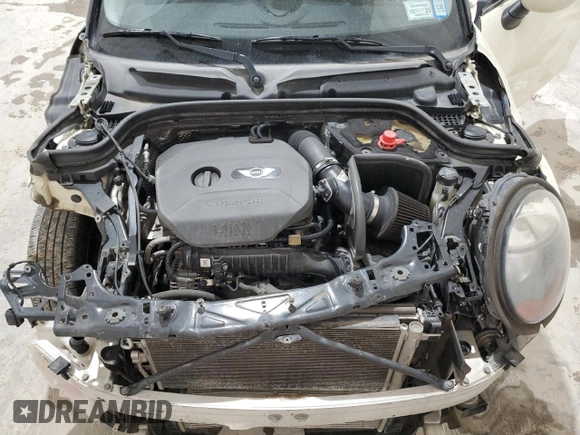 2015 MINI Hardtop with VIN WMWXM5C58FT973235, listed as a Copart auction lot 49988015 with 119,683 mi miles and Salvage Title. Bid and sale history available at DreamBid. Image 11.