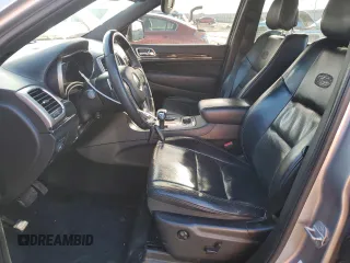 2015 Jeep Grand Cherokee Overland with VIN 1C4RJFCT8FC619014, listed as a Copart auction lot 44304375 with 123,767 mi miles and Salvage Title. Bid and sale history available at carsss.com. Image 7.