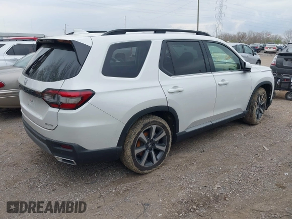 2023 Honda Pilot Elite with VIN 5FNYG1H80PB020937, listed as a IAAI auction lot 42024743 with 20,740 mi miles and . Bid and sale history available at DreamBid. Image 4.