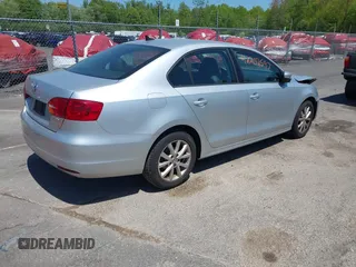2012 Volkswagen Jetta SE with VIN 3VWDP7AJ8CM465069, listed as a IAAI auction lot 42202597 with 106,963 mi miles and . Bid and sale history available at DreamBid. Image 4.