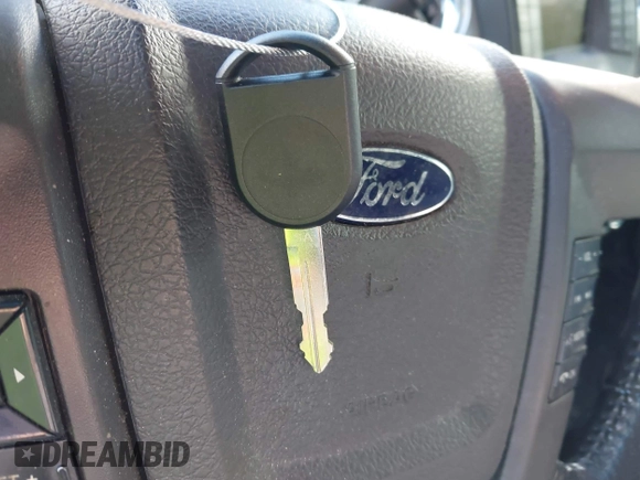 2013 Ford F-150 XL with VIN 1FTFW1ET5DFD40667, listed as a IAAI auction lot 42229870 with 148,895 mi miles and . Bid and sale history available at DreamBid. Image 11.
