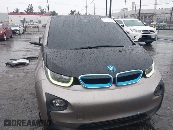 2014 BMW i3 with VIN WBY1Z4C58EV276329, listed as a IAAI auction lot 41570602 with 87,925 mi miles and . Bid and sale history available at DreamBid. Image 6.