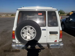 1990 Isuzu Trooper с VIN JACCH58R2L8912963, выставлен на аукционе Copart как лот 53236865 с пробегом 206 634 миль миль и Чистый • Clean title. История ставок и продаж доступна на DreamBid. Изображение 6.