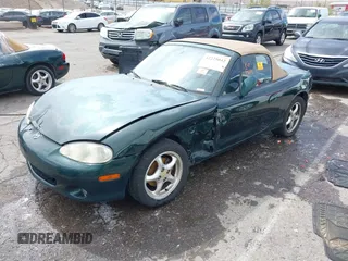 2002 Mazda MX-5 Miata Cloth z VIN JM1NB353720222073, wystawiony jako IAAI lot #42225042 z przebiegiem 94 992 mil mil oraz . Historia ofert i sprzedaży dostępna na DreamBid. Obrazek 2.