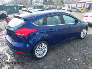 2017 Ford Focus Titanium with VIN 1FADP3N25HL272276, listed as a IAAI auction lot 41630327 with 110,899 mi miles and . Bid and sale history available at DreamBid. Image 4.