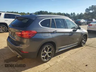 2016 BMW X1 xDrive28i z VIN WBXHT3Z30G4A47563, wystawiony jako Copart lot #50252555 z przebiegiem 99 975 mil mil oraz Szkoda całkowita • Salvage title. Historia ofert i sprzedaży dostępna na DreamBid. Obrazek 3.