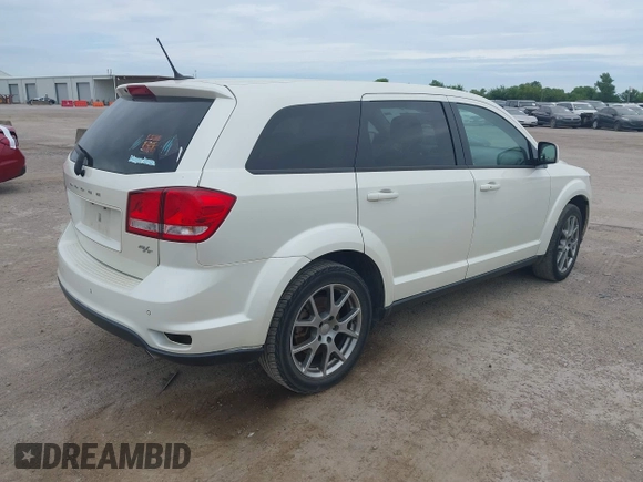 2016 Dodge Journey R/T with VIN 3C4PDCEG7GT182271, listed as a IAAI auction lot 42649784 with 129,663 mi miles and . Bid and sale history available at DreamBid. Image 4.