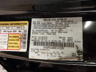 2014 Ford Fusion SE Hybrid with VIN 3FA6P0LU8ER151329, listed as a IAAI auction lot 41643515 with 121,161 mi miles. Bid and sale history available at carsss.com. Image 9.