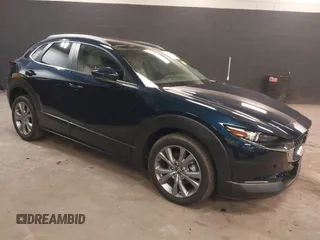 2024 Mazda CX-30 S Preferred z VIN 3MVDMBCM9RM700673, wystawiony jako IAAI lot #42417844 z przebiegiem 7 385 mil mil oraz . Historia ofert i sprzedaży dostępna na DreamBid. Obrazek 1.