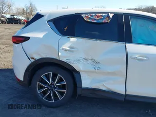2017 Mazda CX-5 Grand Touring with VIN JM3KFBDL6H0188517, listed as a IAAI auction lot 41093178 with 98,831 mi miles. Bid and sale history available at carsss.com. Image 6.