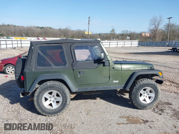 2006 Jeep Wrangler Rubicon z VIN 1J4FA69SX6P788424, wystawiony jako IAAI lot #41712349 z przebiegiem 121 684 mil mil oraz . Historia ofert i sprzedaży dostępna na DreamBid. Obrazek 14.