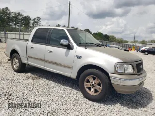 2002 Ford F-150 XLT with VIN 1FTRW07L12KA11845, listed as a Copart auction lot 51987205 with 282,865 mi miles and Salvage Title. Bid and sale history available at carsss.com. Image 4.