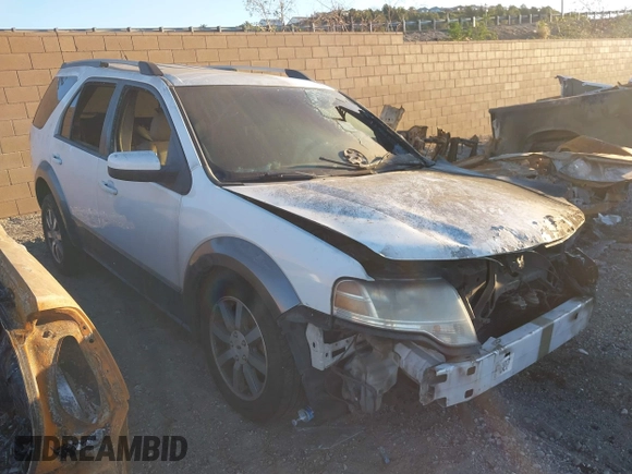 2008 Ford Taurus X SEL z VIN 1FMDK05W38GA32822, wystawiony jako IAAI lot #41630130 z przebiegiem Nie podano mil oraz . Historia ofert i sprzedaży dostępna na DreamBid. Obrazek 1.