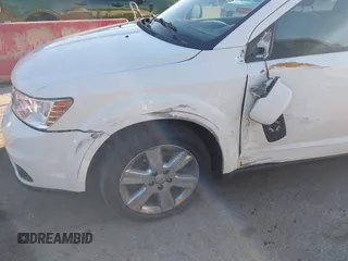 2013 Dodge Journey Crew with VIN 3C4PDCDG3DT521556, listed as a IAAI auction lot 41852888 with 209,562 mi miles and . Bid and sale history available at DreamBid. Image 14.