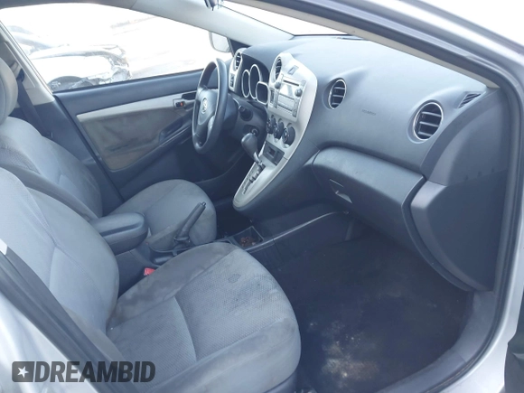 2009 Toyota Matrix with VIN 2T1KU40E59C106253, listed as a IAAI auction lot 41974823 with 126,155 mi miles. Bid and sale history available at carsss.com. Image 5.