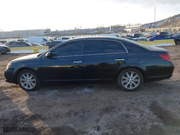 2009 Toyota Avalon XL with VIN 4T1BK36B39U351127, listed as a IAAI auction lot 41450214 with NaN miles. Bid and sale history available at carsss.com. Image 15.