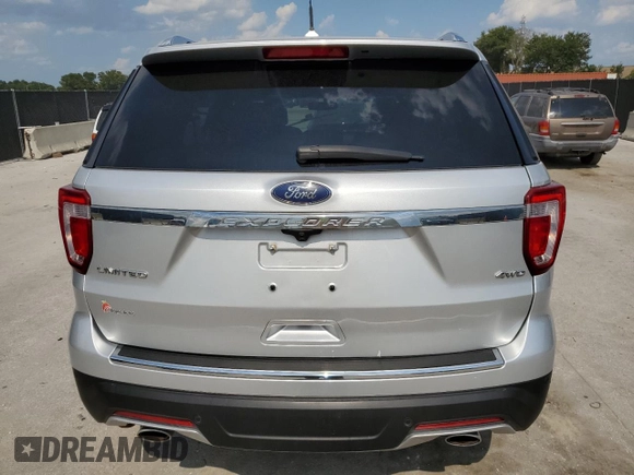 2018 Ford Explorer Limited с VIN 1FM5K8F88JGA85573, выставлен на аукционе Copart как лот 66836205 с пробегом 64 764 миль миль и Списание • Salvage title. История ставок и продаж доступна на DreamBid. Изображение 6.
