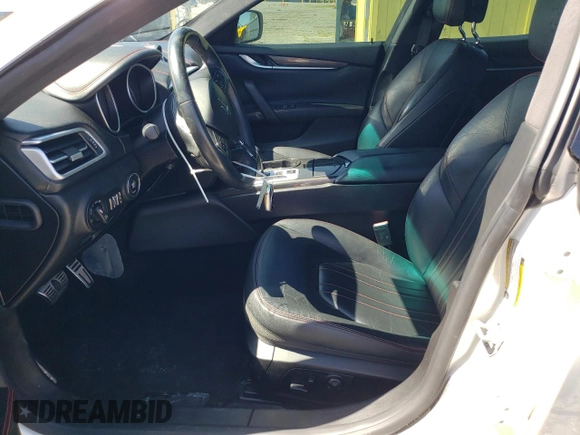 2016 Maserati Ghibli z VIN ZAM57XSA8G1166993, wystawiony jako Copart lot #51677735 z przebiegiem 58 215 mil mil oraz Tytuł czysty. Historia ofert i sprzedaży dostępna na DreamBid. Obrazek 7.