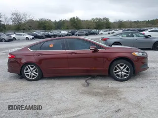 2015 Ford Fusion SE with VIN 3FA6P0H7XFR301154, listed as a IAAI auction lot 41806333 with 130,226 mi miles and . Bid and sale history available at DreamBid. Image 13.