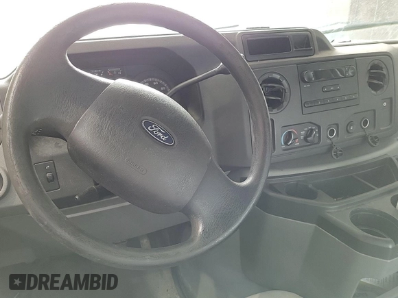 2013 Ford Econoline Cargo Commercial with VIN 1FTNE1EW6DDB01438, listed as a IAAI auction lot 42796072 with 125,160 mi miles and . Bid and sale history available at DreamBid. Image 29.