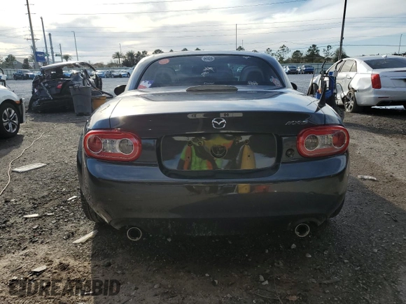2015 Mazda MX-5 Miata Grand Touring z VIN JM1NC2PF3F0239991, wystawiony jako Copart lot #46989165 z przebiegiem 139 801 mil mil oraz Szkoda całkowita • Salvage title. Historia ofert i sprzedaży dostępna na DreamBid. Obrazek 6.