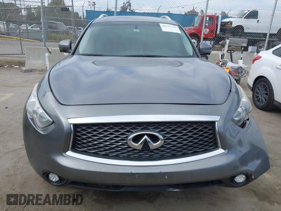 2014 Infiniti QX70 with VIN JN8CS1MU8EM450428, listed as a IAAI auction lot 42233727 with 88,342 mi miles and . Bid and sale history available at DreamBid. Image 12.