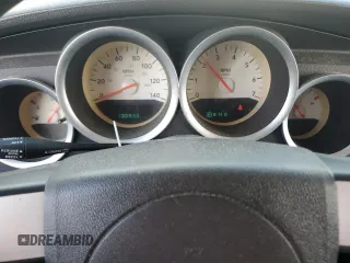 2006 Dodge Magnum z VIN 2D4FV47V96H427821, wystawiony jako Copart lot #71942434 z przebiegiem 130 990 mil mil oraz Szkoda całkowita • Salvage title. Historia ofert i sprzedaży dostępna na DreamBid. Obrazek 9.
