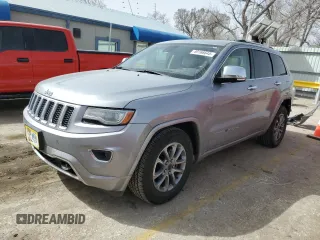 2014 Jeep Grand Cherokee Overland with VIN 1C4RJFCG4EC326325, listed as a Copart auction lot 49166645 with 128,261 mi miles and Salvage Title. Bid and sale history available at DreamBid. Image 1.
